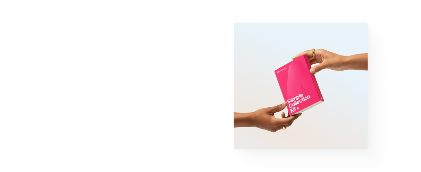 Two outstretched hands holding the pink Medichecks blood sample kit - one hand is giving, the other receiving. 