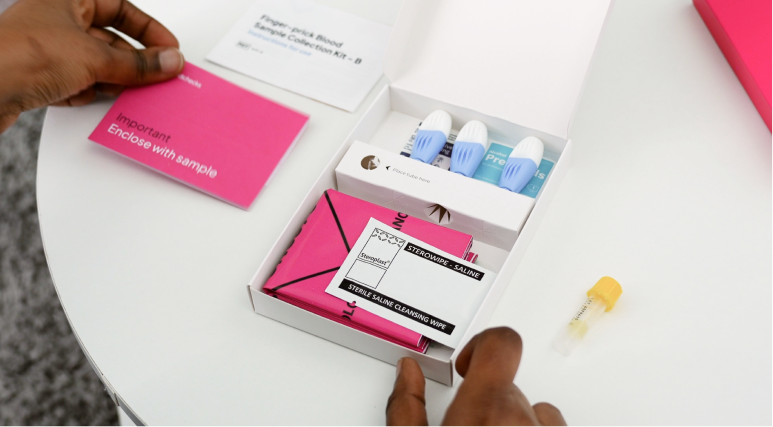  Inside content  of a Medichecks finger prick blood sample collection kit.